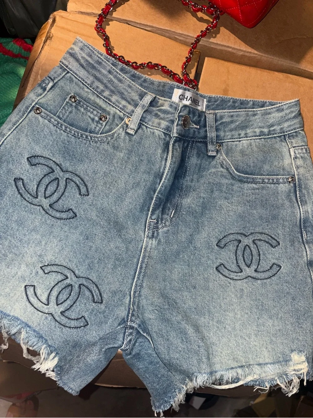 CHANEL Light Blue Embroidered CC Denim Shorts